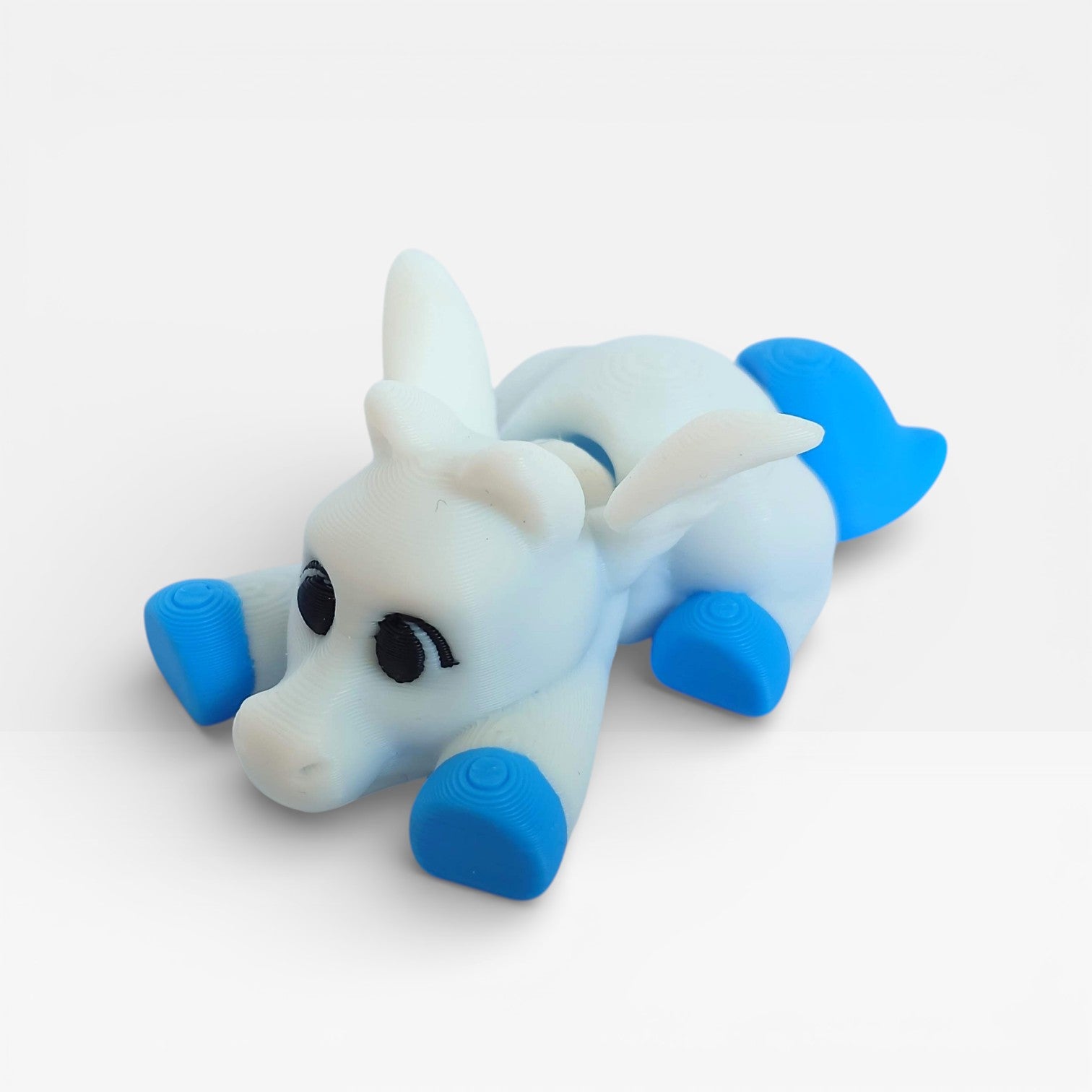 3D spausdintas mini fantastinis gyvūnas (magnetukas).